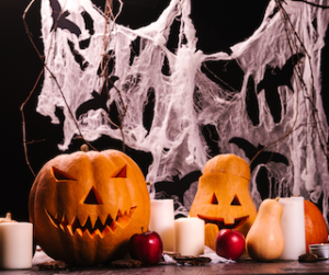 carved pumpkins and spider webs