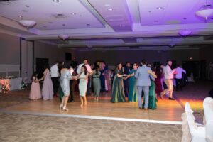 A wedding reception at Ocoee Lakeshore Center on the dance floor in their ballroom.