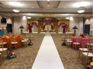 An indian wedding reception and ceremony set up inside Ocoee Lakeshore Center.