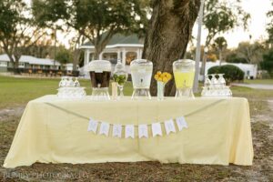 A drink stand featuring refreshments outside of Ocoee Lakeshore Center by Bumby Photography.