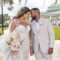 Bride and Groom in front of Ocoee Lakeshore Center in their summer fabric