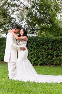 Bride and Groom in summer fabrics at the wedding pavilion at Ocoee Lakeshore Center
