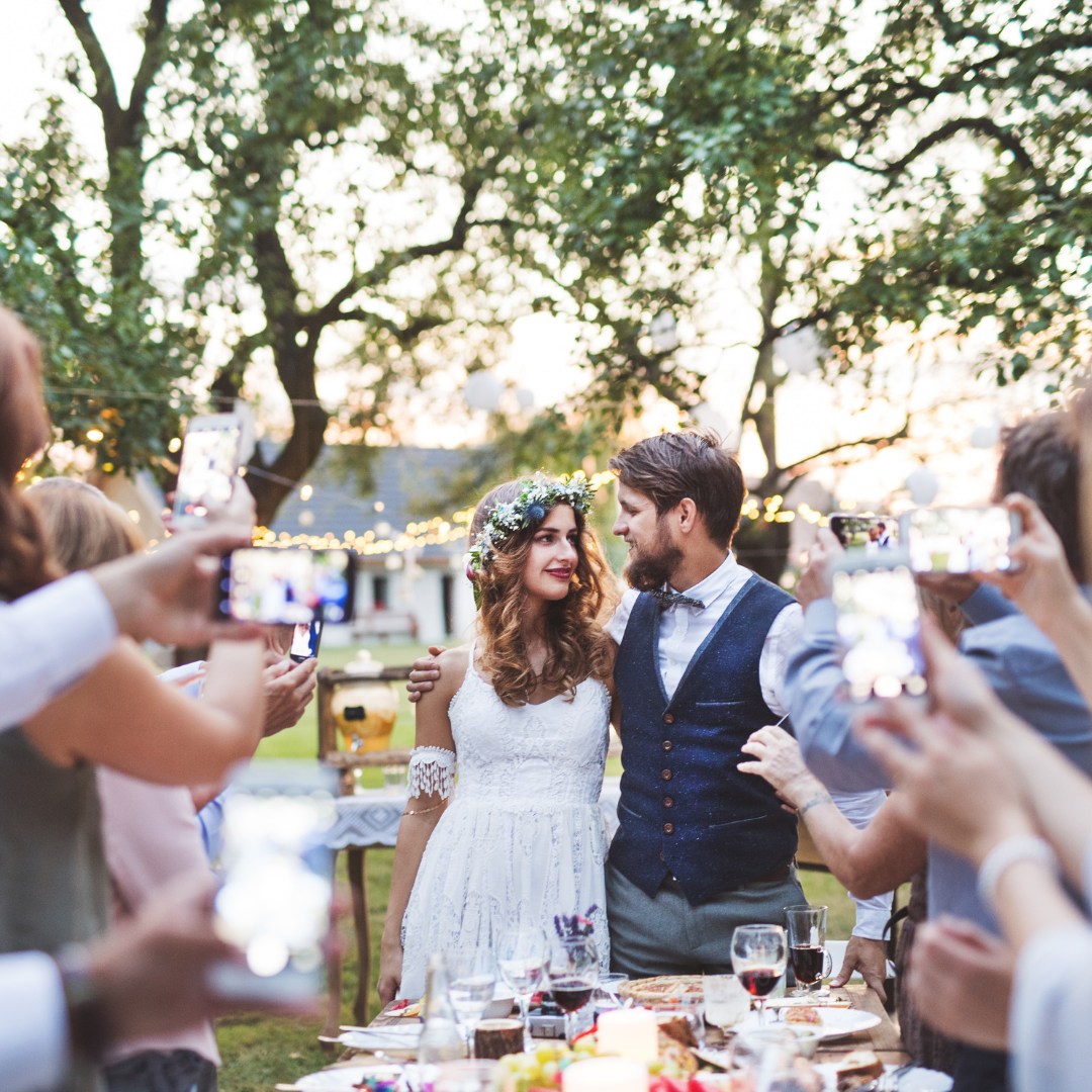 Wedding couple at small reception on the picturesque grounds of Ocoee Lakeshore Center